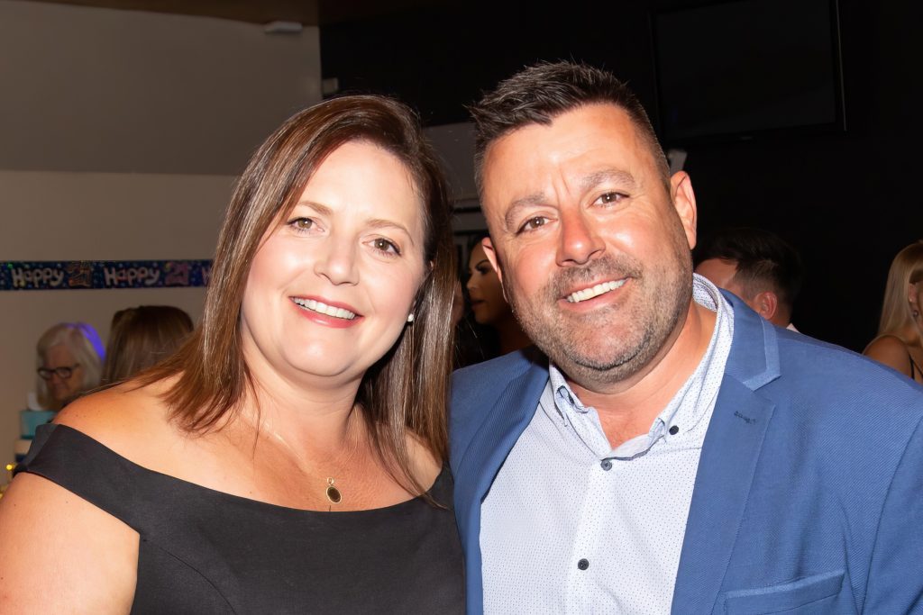 Adelaide Boxing Turner Gym A man and woman posing for a photo at a NYS 2024 party.